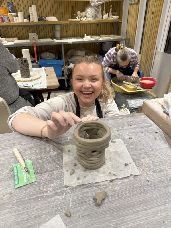 Bonita coiling a pot